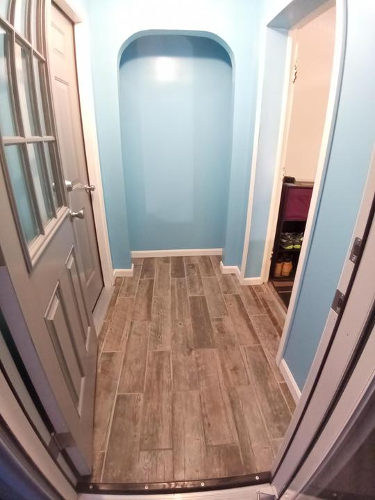 Floor tile installation, trim installation, and painting